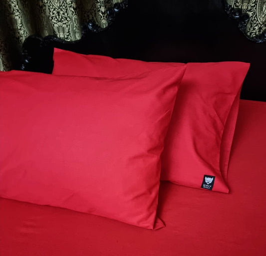 Plain red easy care pillowcase pair